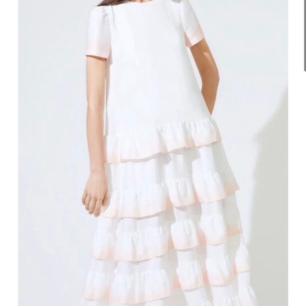 White Long with Ruffle Dress with peach color around ruffles.